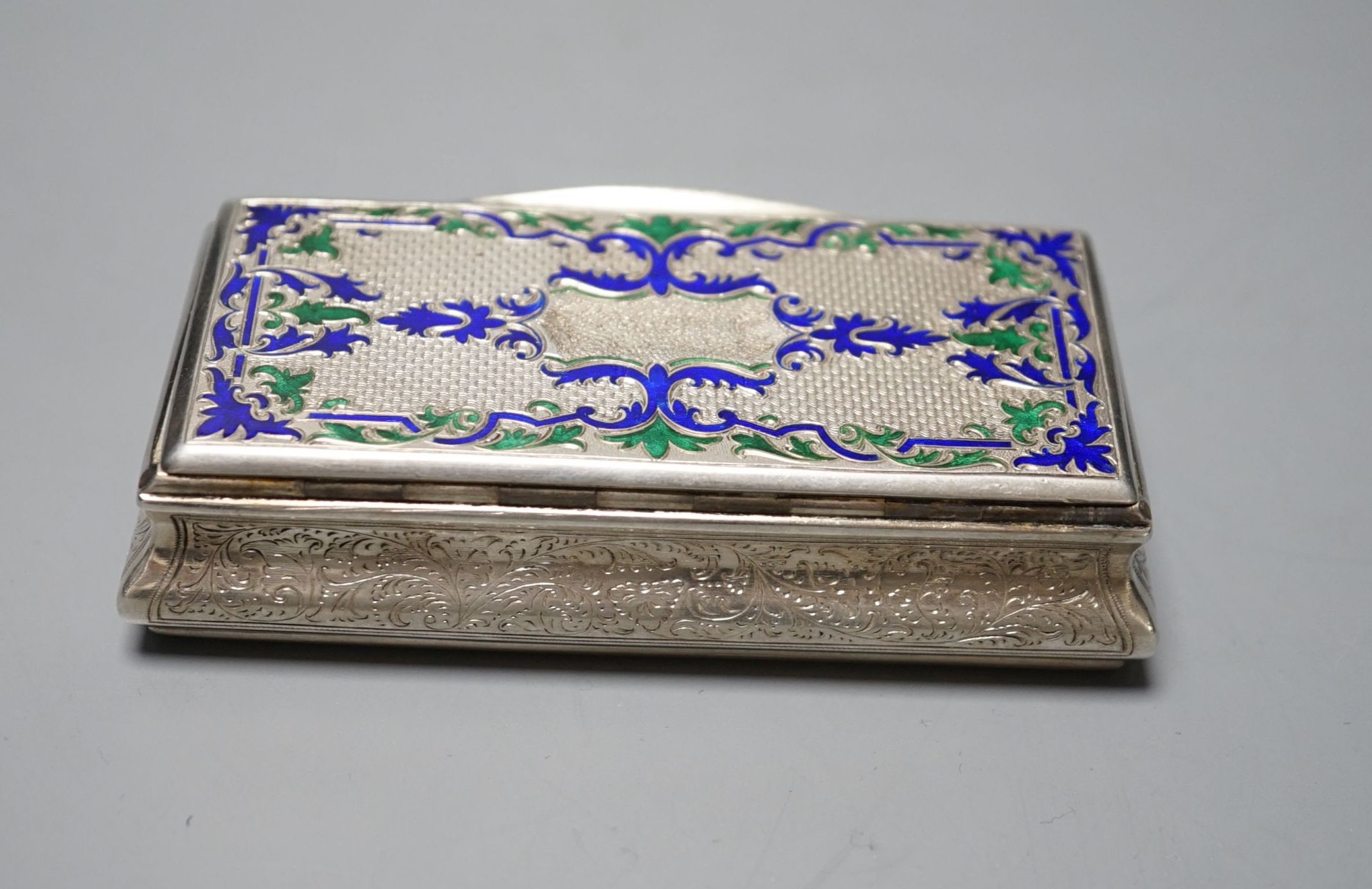 A 19th century Austro-Hungarian white metal and two colour enamel snuff box, with interior engraved inscription, 92mm, gross weight 98.2 grams.